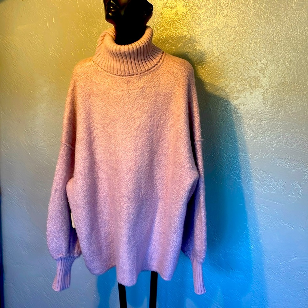Free people lavender pullover sweater says small, but it is very large